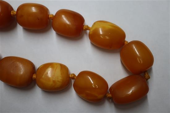 A single strand amber bead necklace, gross weight 48 grams, 57cm.